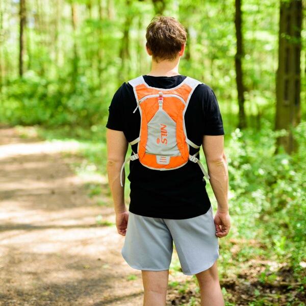Běžecký batoh NILS Camp Tripper oranžový lifestyle